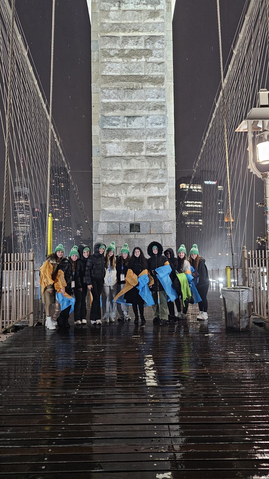 A CTeen teen under the arches of the Brooklyn Bridge