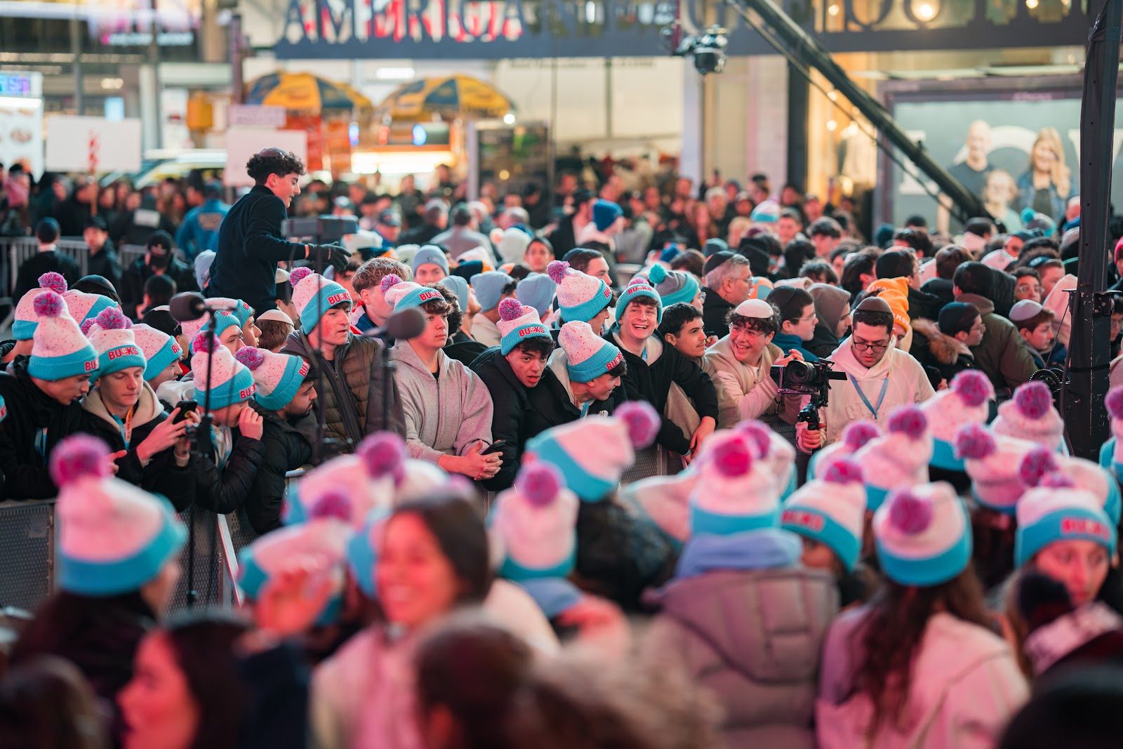 A street packed with CTeen teens in Bucks beanies during the CTeen International Shabbaton