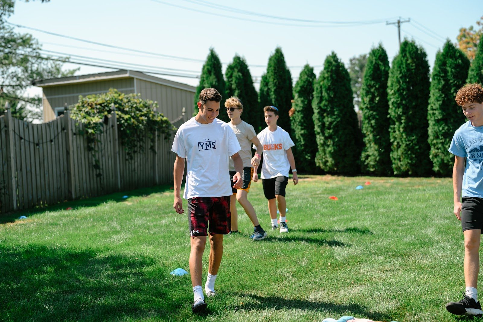CTeen Bucks teens volunteering and hanging out together outdoors